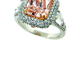 Pink diamond ring with white diamond pavé